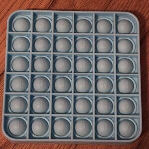 Chuckle & Roar Pop It! Letters Numbers Educational Travel Fidget & Sensory Game